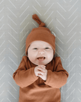 Organic Ribbed Newborn Knot Hat, Rust